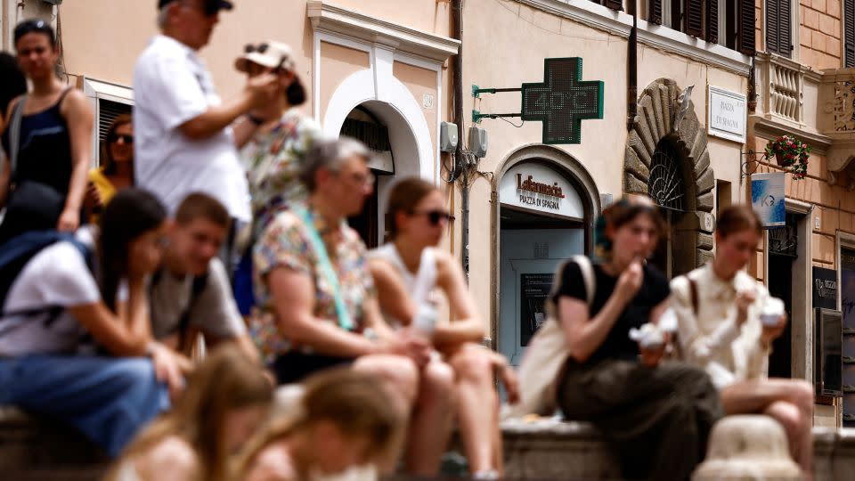 Tourists in southern Europe are advised to acclimatise before undertaking any strenuous activities in the heat. - Guglielmo Mangiapane/Reuters