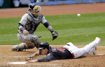 <p>Cleveland Indians’ Bradley Zimmer slides safely into home plate as Tampa Bay Rays catcher Jesus Sucre can’t hold onto the ball in the third inning of a baseball game,, May 17, 2017, in Cleveland. Zimmer scored on Jason Kipnis’s single. (Photo: Tony Dejak/AP) </p>