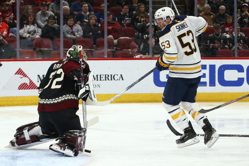 Arizona Coyotes goaltender Antti Raanta (32) makes a save on a shot by Buffalo Sabres left wing Jeff Skinner (53) during the second period of an NHL hockey game Saturday, Feb. 29, 2020, in Glendale, Ariz. (AP Photo/Ross D. Franklin)