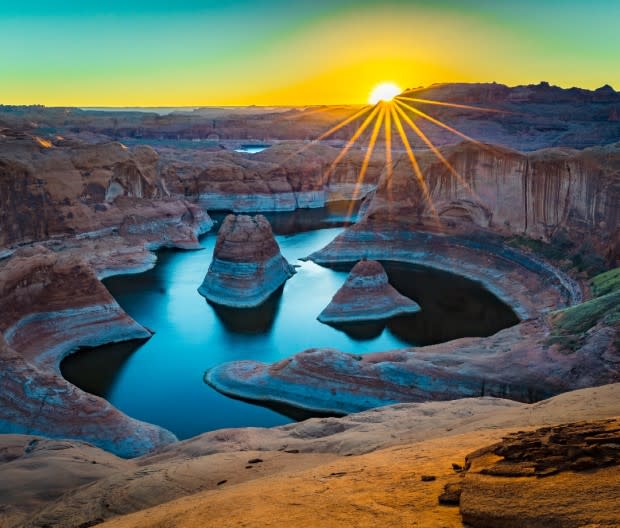 Solitude is guaranteed at Reflection Canyon, tucked at the end of a long washboard road or multi-day hike in the south end of the monument.<p>Through the Lens</p>