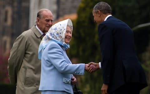 The Queen and Prince Philip greet former US President Barack Obama outside Windsor Castle in 2016 - Credit: JIM WATSON/AFP/Getty Images