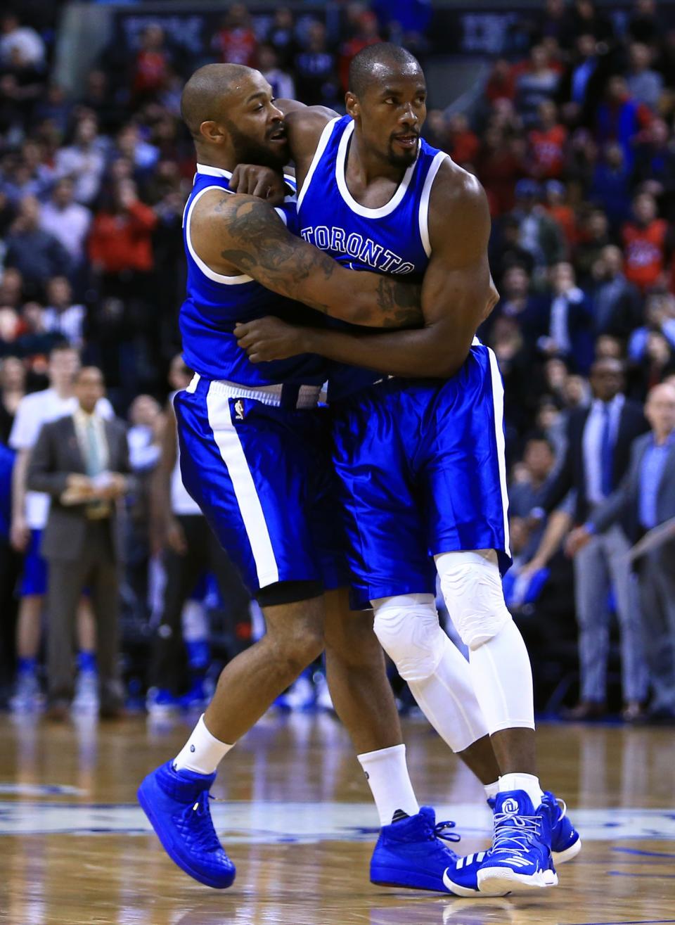 <p>P.J. Tucker #2 holds back teammate Serge Ibaka #9 of the Toronto Raptors after a fight with Robin Lopez #8 of the Chicago Bulls during the second half of an NBA game at Air Canada Centre on March 21, 2017 in Toronto, Canada. NOTE TO USER: User expressly acknowledges and agrees that, by downloading and or using this photograph, User is consenting to the terms and conditions of the Getty Images License Agreement. (Photo by Vaughn Ridley/Getty Images) </p>