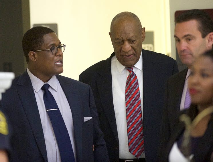 Bill Cosby (R) walks with aide Andrew Wyatt (L) during a break on the third day of Cosby's trial on sexual assault charges in the Montgomery County Courthouse June 7, 2017 in Norristown, Pennsylvania. A former Temple University employee alleges that the entertainer drugged and molested her in 2004 at his home in suburban Philadelphia. More than 40 women have accused the 79-year-old entertainer of sexual assault. (Photo: Mark Makela/Getty Images)