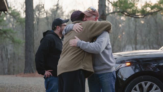 <p>courtesy netflix</p> Dennis Shepard gives Wayne Maines a hug goodbye as all of the dads prepare to leave Oklahoma.