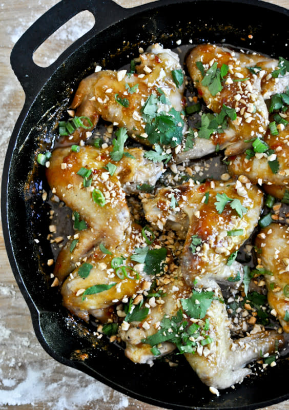 <p>How Sweet Eats</p><p>You won't believe these wings bursting with Thai flavors are cooked in one pot!</p><p><strong>Get the recipe: <a href="https://www.howsweeteats.com/2012/05/sticky-thai-chicken-wings/" rel="nofollow noopener" target="_blank" data-ylk="slk:Sticky Thai Chicken Wings;elm:context_link;itc:0;sec:content-canvas" class="link ">Sticky Thai Chicken Wings</a></strong></p>