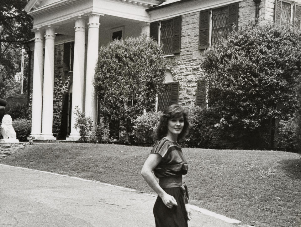 Priscilla in front of Graceland