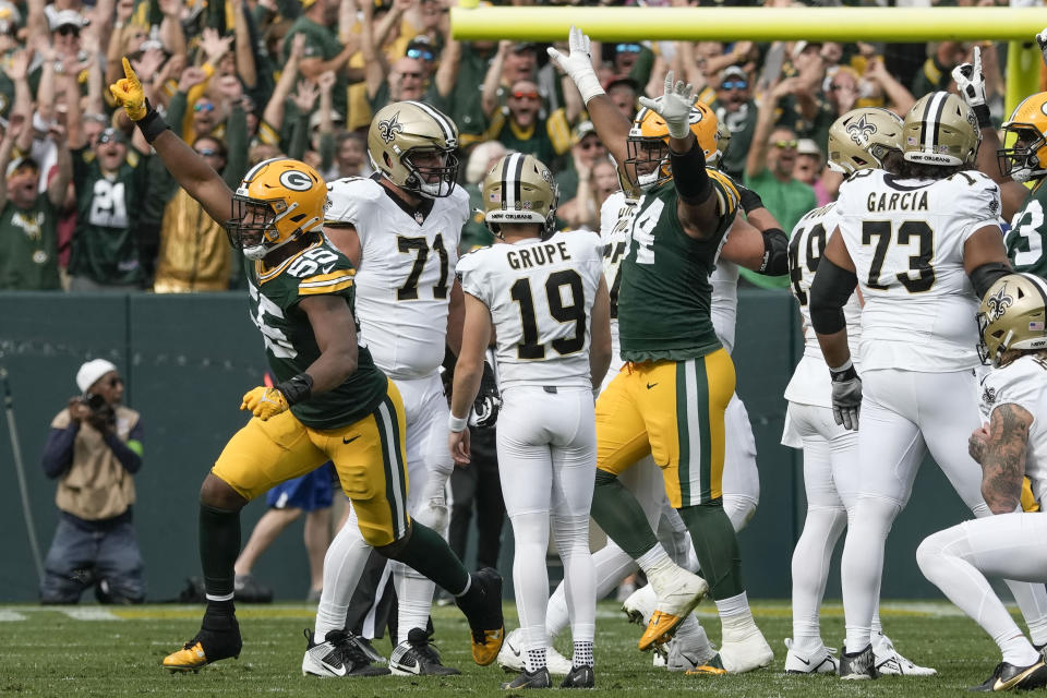 Green Bay Packers linebacker Kingsley Enagbare (55) celebrates after New Orleans Saints place-kicker Blake Grupe (19) missed a field goal during the second half of an NFL football game Sunday, Sept. 24, 2023, in Green Bay, Wis. The Packers won 18-17. (AP Photo/Morry Gash)