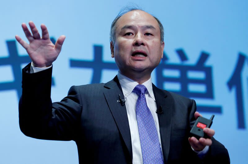 FILE PHOTO: Japan's SoftBank Group Corp Chief Executive Masayoshi Son attends a news conference in Tokyo