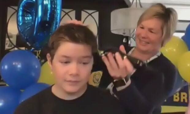 Sam Hull takes part in his sixth Shave for the Brave on Saturday. His father, Rob, was supposed to be by his side taking part in the fundraiser this time, but he passed away in February from a rare bowel cancer. (CBC - image credit)