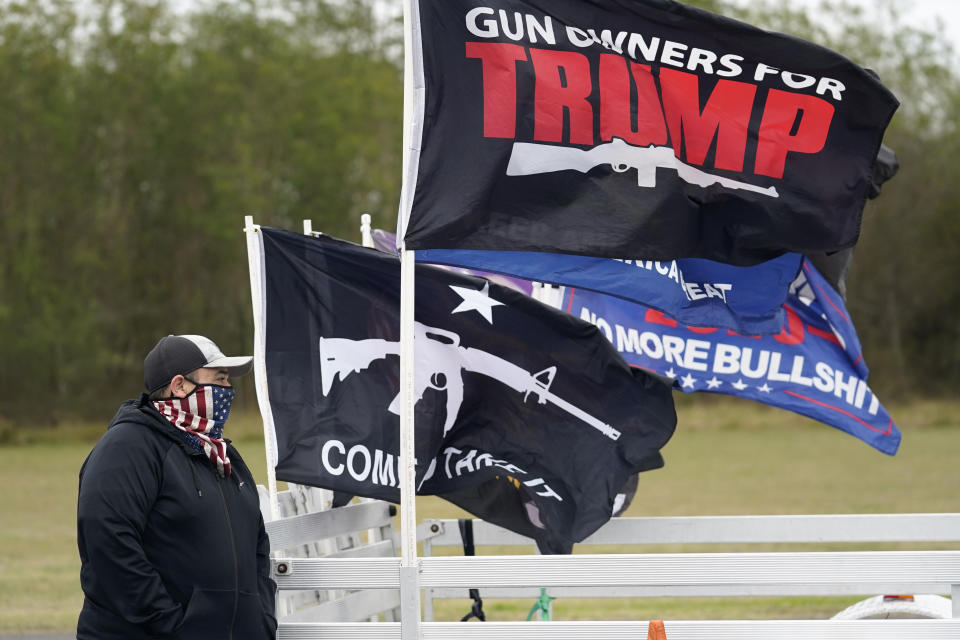 Supporters of President Donald Trump gather in anticipation of his visit to the U.S.-Mexico border, Tuesday, Jan. 12, 2021, in Harlingen, Texas. (AP Photo/Eric Gay)