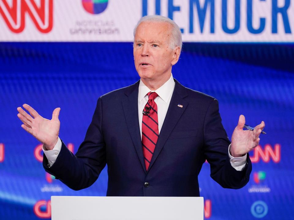 FILE- In this Sunday, March 15, 2020 file photo, former Vice President Joe Biden, participates in a Democratic presidential primary debate at CNN Studios in Washington. Joe Biden swept to victory in Florida, Illinois and Arizona on Tuesday, increasingly pulling away with a Democratic presidential primary upended by the coronavirus and building pressure on Bernie Sanders to abandon his campaign. (AP Photo/Evan Vucci, File)