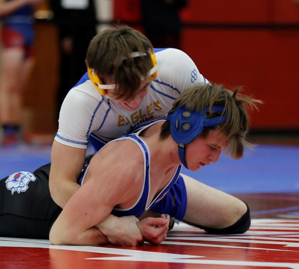 Lincoln's Gavin Sherwood and Centerville's Graham Butler wrestle in the semifinals of the Tri-Eastern Conference Tournament Jan. 22, 2022.