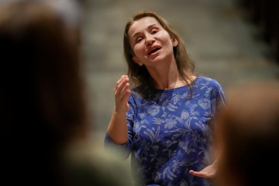 Oct 17, 2023; Columbus, Ohio, USA; Tetiana Matviienko conducts the Ukranian Children's Choir, mainly composed of refugee children, during a rehearsal for the Concert For Ukrain on Oct. 21 at the First Congregational Church downtown.