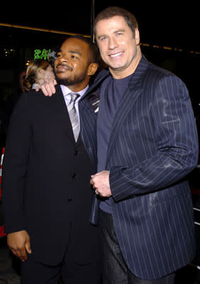 Director F. Gary Gray and John Travolta at the Hollywood premiere of MGM's Be Cool