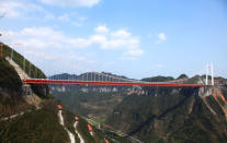 Aizhai is also the fourth suspension bridge in China to cross a valley so wide it seems to be connecting two mountain ranges, and of the world's 400 or so highest bridges, none has a main span as long as Aizhai. AFP PHOTO