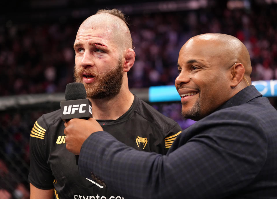 SINGAPORE, SINGAPORE - JUNE 12: Jiri Prochazka of Czech Republic is interviewed by Daniel Cormier after his victory over Glover Teixeira of Brazil in the UFC light heavyweight championship fight during the UFC 275 event at Singapore Indoor Stadium on June 12, 2022 in Singapore. (Photo by Jeff Bottari/Zuffa LLC)