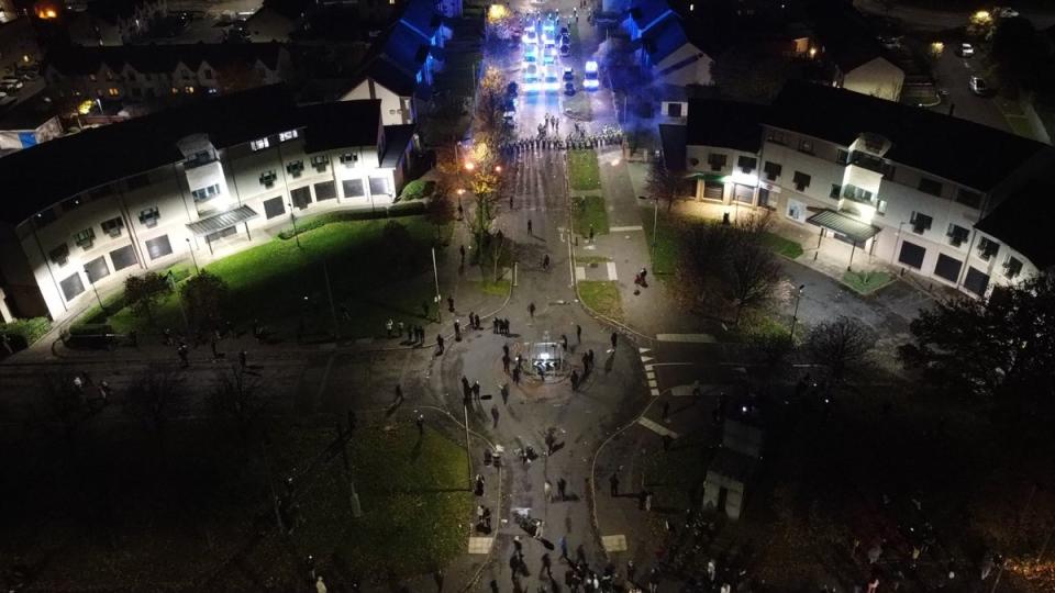 Around 100 young people clashed with riot police in the Niddrie area of Edinburgh (PA)