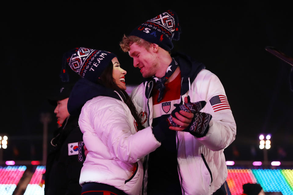 <p>Madison Chock and Evan Bates walk with Team USA in the Parade of Athletes during the Closing Ceremony of the PyeongChang 2018 Winter Olympic Games at PyeongChang Olympic Stadium on February 25, 2018 in Pyeongchang-gun, South Korea. (Photo by Dan Istitene/Getty Images) </p>