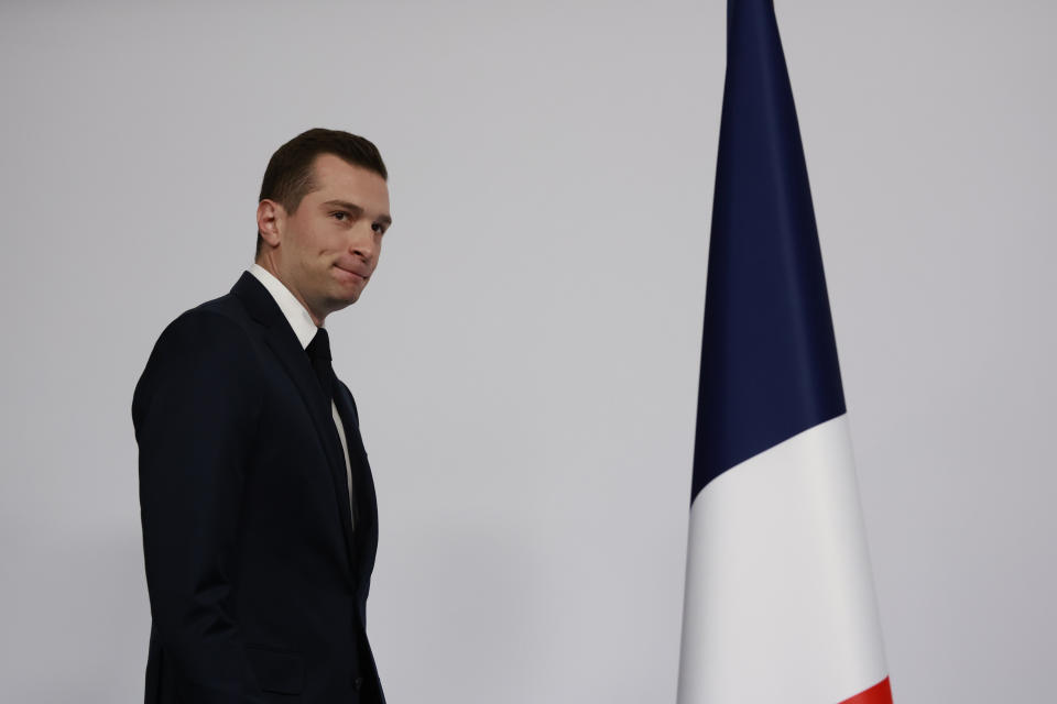 Far-right National Rally party president Jordan Bardella arrives to deliver his speech after the first round vote of the legislative election, Sunday, June 30, 2024 in Paris. France's high-stakes legislative elections propelled the far-right National Rally to a strong but not decisive lead in the first-round vote Sunday, polling agencies' projected, dealing another slap to centrist President Emmanuel Macron after his risky decision to call voters back to the polls for the second time in three weeks. (AP Photo/Aurelien Morissard)