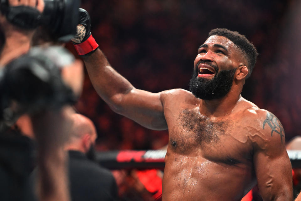 Jan 20, 2024; Toronto, Canada, USA; Chris Curtis (red glove) celebrates defeating Marc-Andre Barriault (blue gloves) during UFC 297 at ScotiaBank Arena. Mandatory Credit: Dan Hamilton-USA TODAY Sports