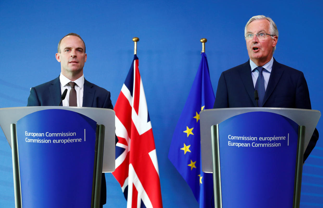 Dominic Raab and Michel Barnier speaking together in Brussels (Reuters)