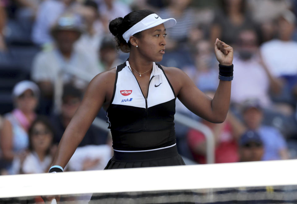 Naomi Osaka, of Japan, reacts after defeating Magda Linette, of Poland, during the second round of the US Open tennis championships Thursday, Aug. 29, 2019, in New York. (AP Photo/Eduardo Munoz Alvarez)