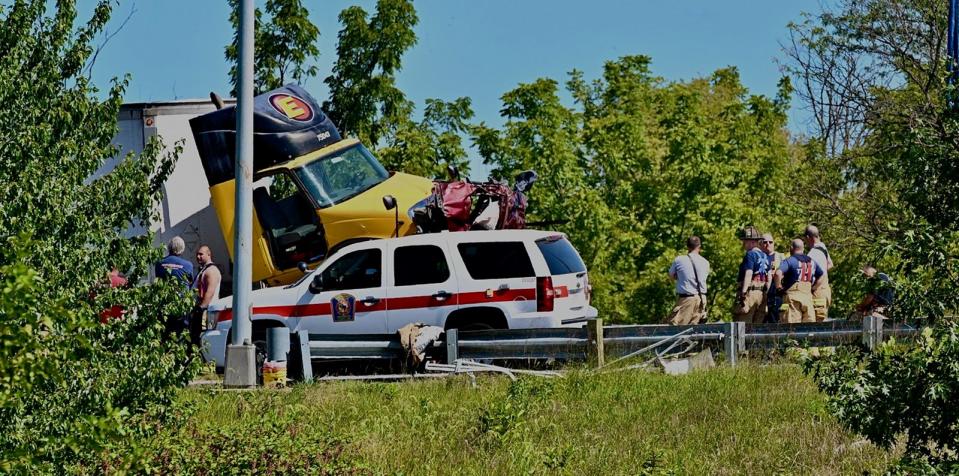 Emergency responders are seen at the site of a deadly crash that involved four tractor-trailers and two passenger vehicles Friday morning on Interstate 81 north of Hagerstown. At least one person was killed and multiple people were injured.