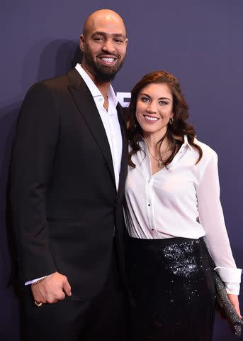 <p>Matthias Hangst/Getty</p> Jerramy Stevens and Hope Solo in 2016