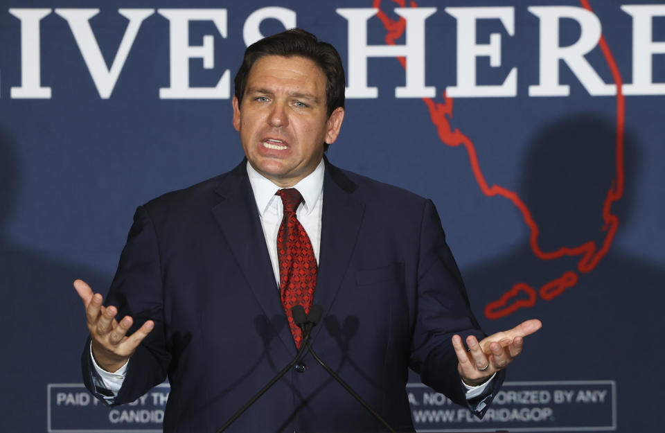 FILE - Florida Gov. Ron DeSantis speaks to a crowd of supporters during the Keep Florida Free Tour on Wednesday, Aug. 24, 2022, in Tampa, Fla. DeSantis on Wednesday, Sept. 14 flew two planes of immigrants to Martha's Vineyard, escalating a tactic by Republican governors to draw attention to what they consider to be the Biden administration's failed border policies. (Luis Santana/Tampa Bay Times via AP, File)