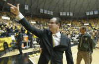 Wichita State coach Gregg Marshall points to the crowd after his team completed a perfect 31-0 regular season by beating Missouri State 68-45 in an NCAA college basketball game in Wichita, Kansas., Saturday, March 1, 2014. (AP Photo/The Wichita Eagle, Travis Heying) LCOAL TV OUT; MAGS OUT; LOCAL RADIO OUT; LOCAL INTERNET OUT