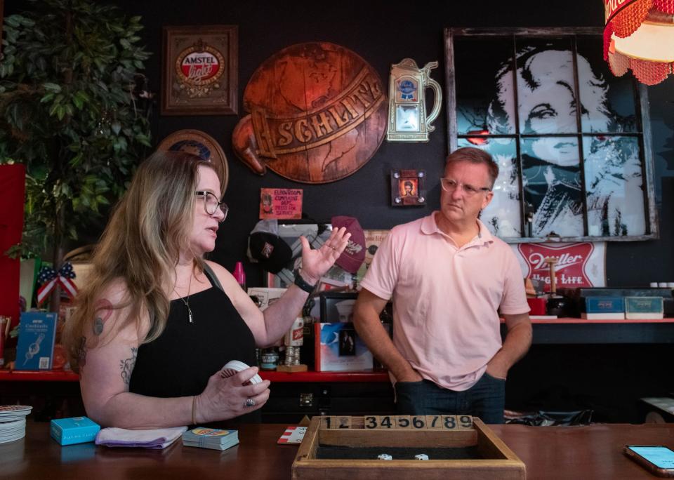 Co-owners Lesa Touchette, left, and Jonathan Owens talk about the history of the Elbow Room in Pensacola on Friday, Sept. 29, 2023. The Elbow Room is celebrating its 60th anniversary.