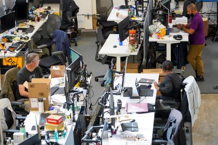 Staff work at the offices of Ouster self-driving technology company in San Francisco