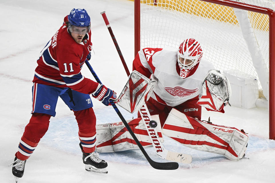 Montreal Canadiens' Brendan Gallagher moves in on Detroit Red Wings goatender Ville Husso during the second period of an NHL hockey game, Saturday, Dec. 2, 2023 in Montreal. (Graham Hughes/The Canadian Press via AP)