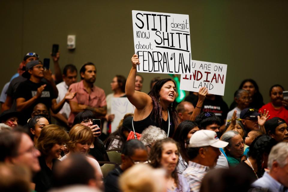 Kelsey Cooper hold a sign and argues with the panel to address post-McGirt concerns on July 13, 2021 in Tulsa, OK. MICHAEL NOBLE JR./TULSA WORLD