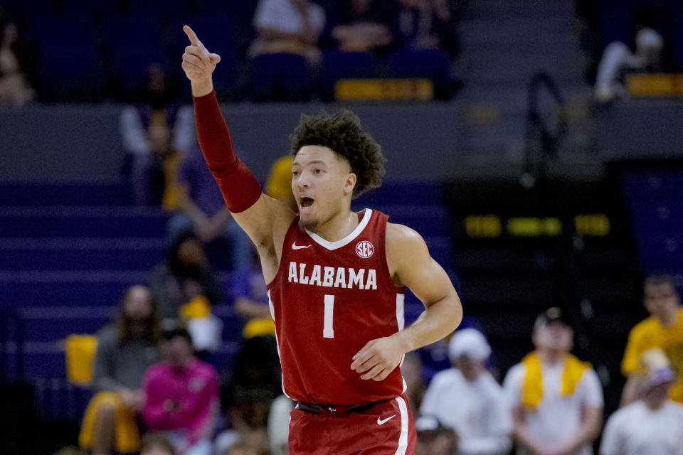 Alabama guard Mark Sears (1) reacts after a three point basket against LSU during the first half of an NCAA college basketball game in Baton Rouge, La., Saturday, Feb. 10, 2024. (AP Photo/Matthew Hinton)