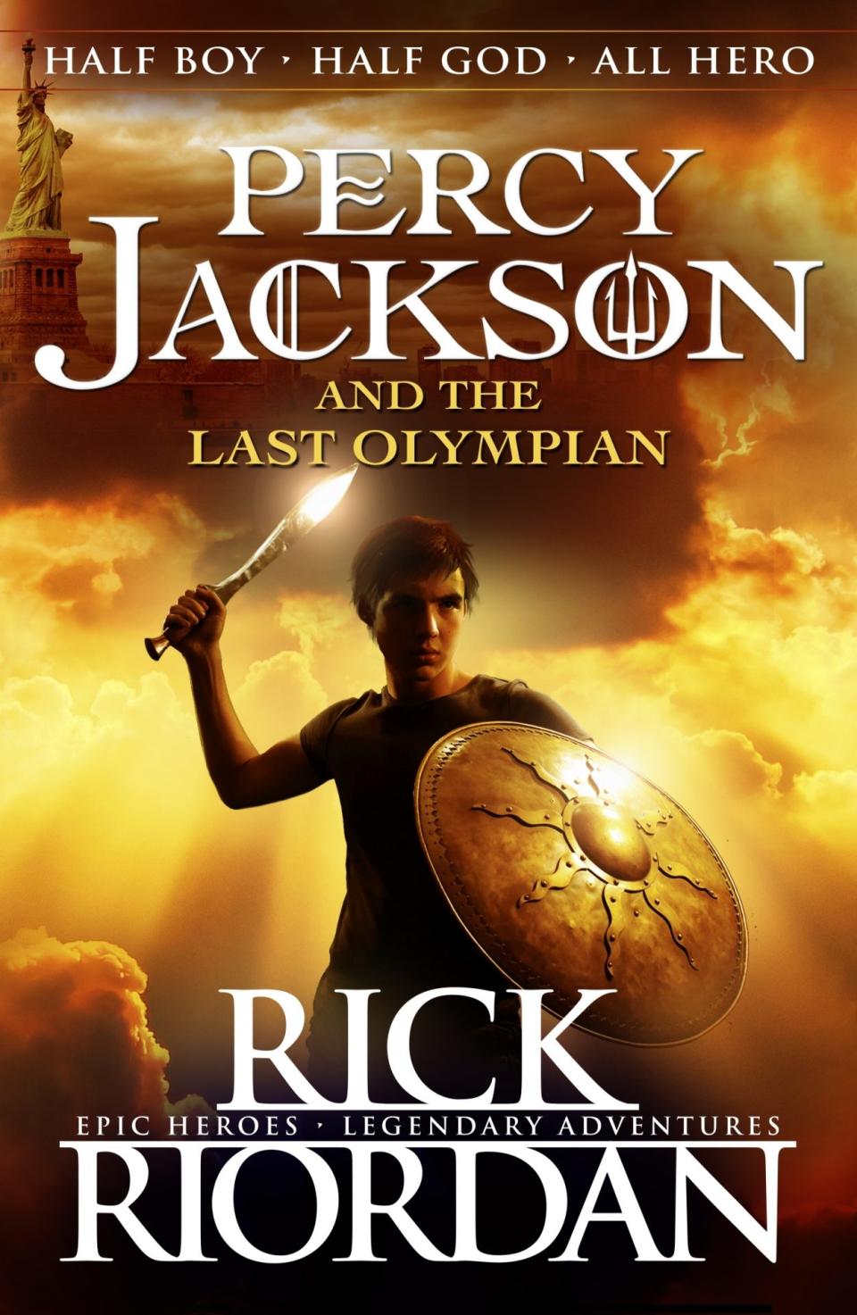 Percy Jackson raises his sword and shield on the cover of The Last Olympian