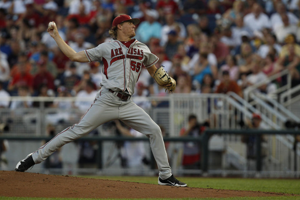 June 18, 2012; Omaha, NE, USA; Arkansas Razorbacks pitcher Ryne Stanek (55) throws against the <a class="link " href="https://sports.yahoo.com/ncaaw/teams/south-carolina/" data-i13n="sec:content-canvas;subsec:anchor_text;elm:context_link" data-ylk="slk:South Carolina Gamecocks;sec:content-canvas;subsec:anchor_text;elm:context_link;itc:0">South Carolina Gamecocks</a> during the second inning of game eight of the 2012 College World Series at TD Ameritrade Park. Mandatory Credit: Bruce Thorson-USA TODAY Sports