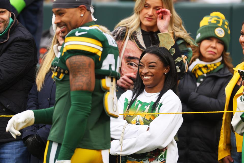 Simone Biles looks on before a game between the Minnesota Vikings and the Green Bay Packers at Lambeau Field on Oct. 29, 2023 in Green Bay.