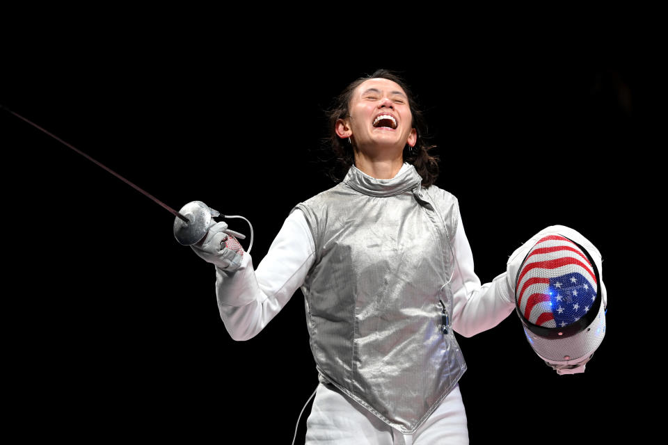 <p>CHIBA, JAPAN - JULY 25: Lee Kiefer of Team United States celebrates after winning the Women's Foil Individual Fencing semifinal 2 against Larisa Korobeynikova of Team ROC on day two of the Tokyo 2020 Olympic Games at Makuhari Messe Hall on July 25, 2021 in Chiba, Japan. (Photo by Matthias Hangst/Getty Images,)</p> 