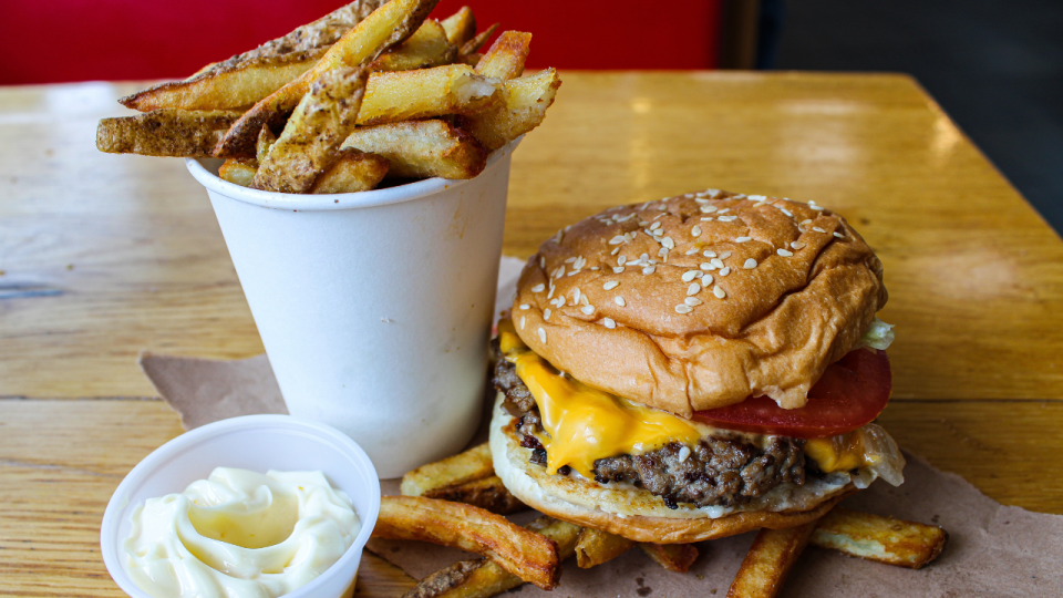 <em>Five Guys boasts more than 250,000 ways to customize your burger and more than 1,000 milkshake combinations. (Adobe Stock)</em>