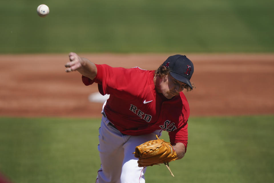 Boston Red Sox starting pitcher Garrett Richards throws in the first inning during a spring training baseball game against the Atlanta Braves on Monday, March 1, 2021, in Fort Myers, Fla. (AP Photo/Brynn Anderson)