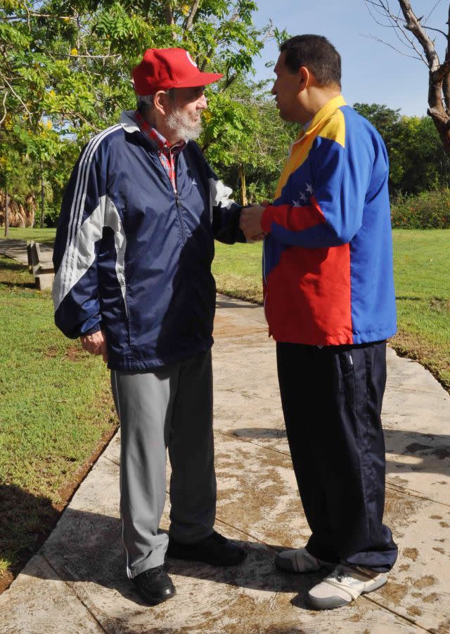Castro met with President Hugo Chavez speak in June 2011, both wearing tracksuits. Chavez's tracksuit sports Venezuelan colors. (AP Photo/Granma)
