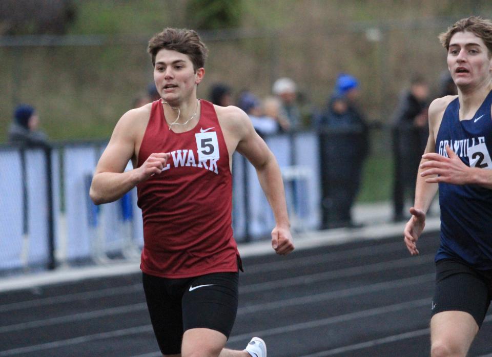 Newark's Ethan Stare and Granville's Owen Kirkham run the 800 at the Granville Invitational on Friday.