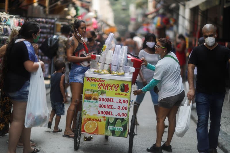 People walk around the Saara street market, amid the outbreak of the coronavirus disease (COVID-19)