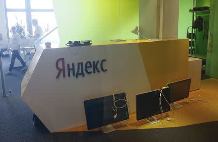 Unplugged computer monitors are seen through a glass door in the office of the Russian internet group Yandex in Kiev, Ukraine, May 29, 2017. REUTERS/Valentyn Ogirenko