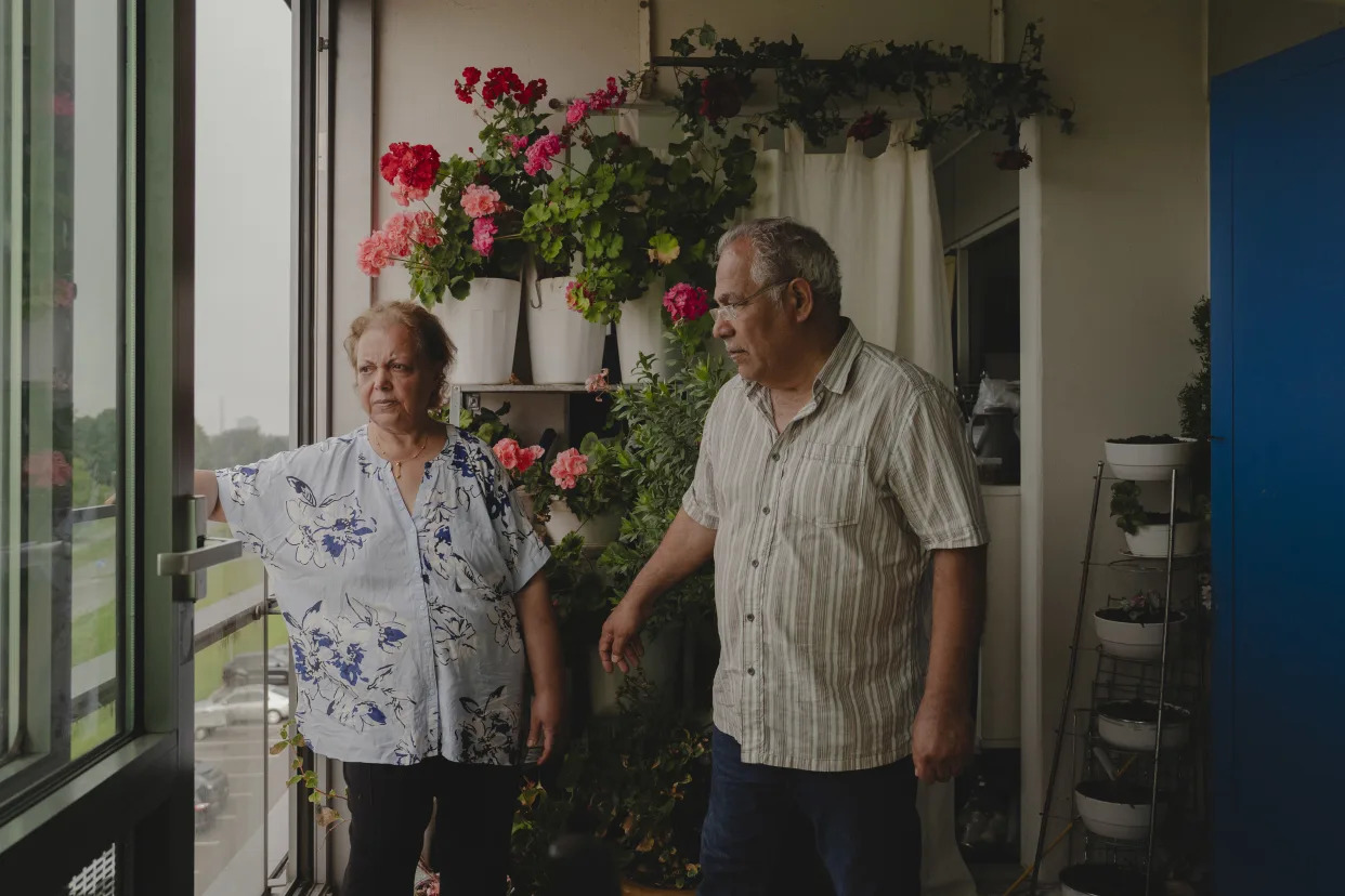 Nasrin Bahrampour and her husband, Ali, at their public housing apartment, which they will be forced to vacate, in Aarhus, Denmark, Sept. 11, 2023. (Charlotte de la Fuente/The New York Times)