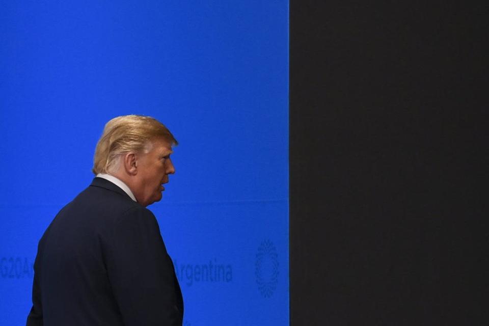 President Trump leaves the stage at the G20 summit (EPA)