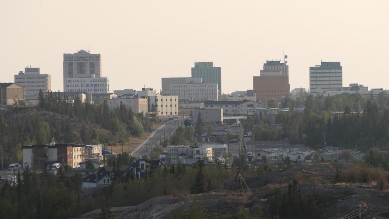 A view of Yellowknife, looking towards downtown, shortly after the territory called a city-wide evacuation due to wildfire. (Tyson Koschik/CBC - image credit)