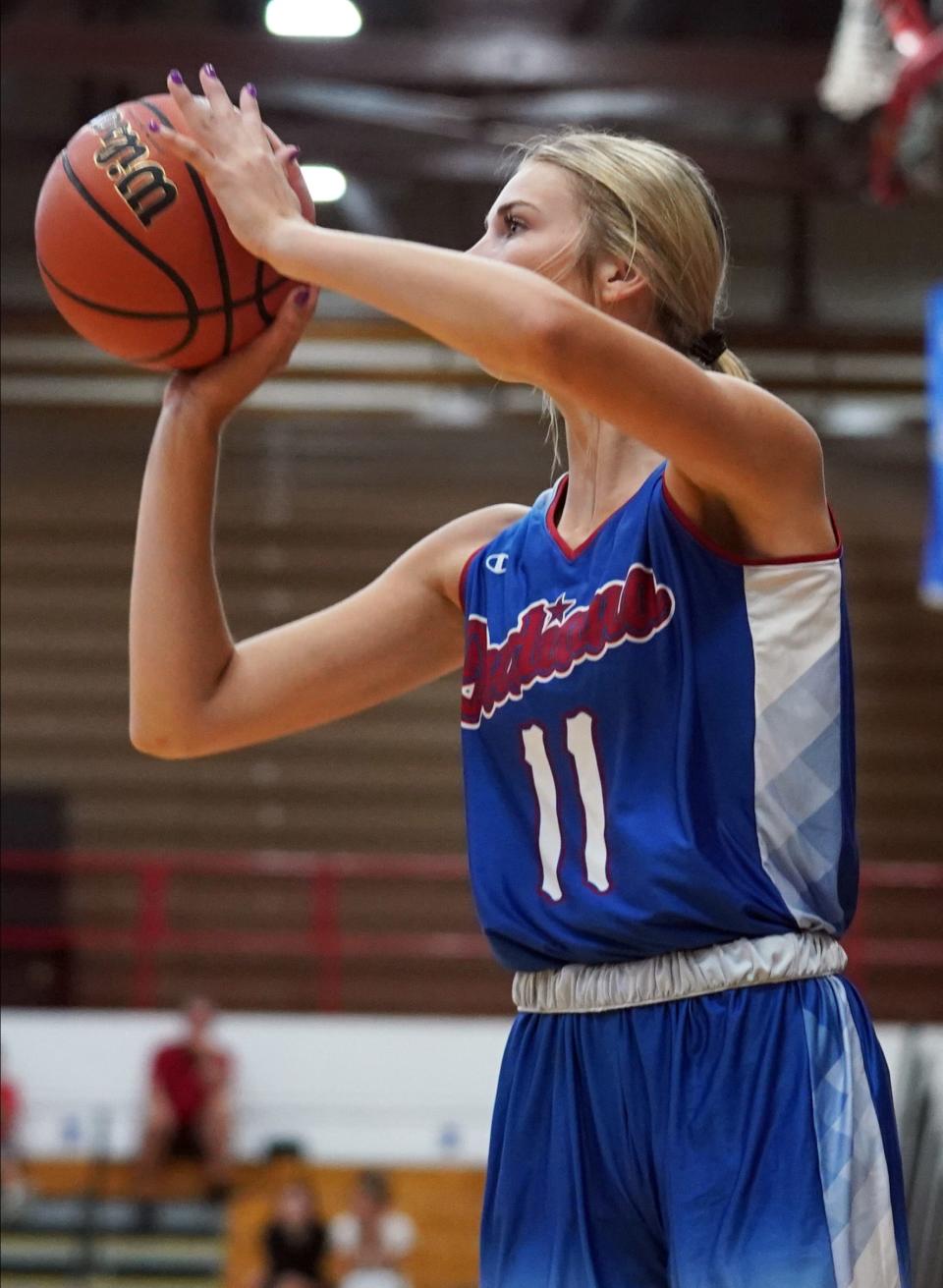 Northwestern's McKenna Layden (11) attempts a shot during the girls’ Indiana vs. Kentucky Junior All-Stars game at Bedford North Lawrence Sunday afternoon. (Bobby Goddin/Herald-Times)