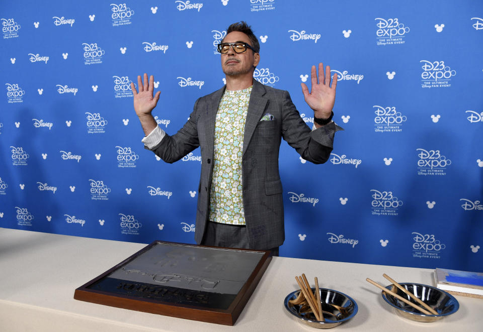 Actor Robert Downey Jr. takes part in his handprint ceremony at the Disney Legends press line during the 2019 D23 Expo, Friday, Aug. 23, 2019, in Anaheim, Calif. (Photo by Chris Pizzello/Invision/AP)